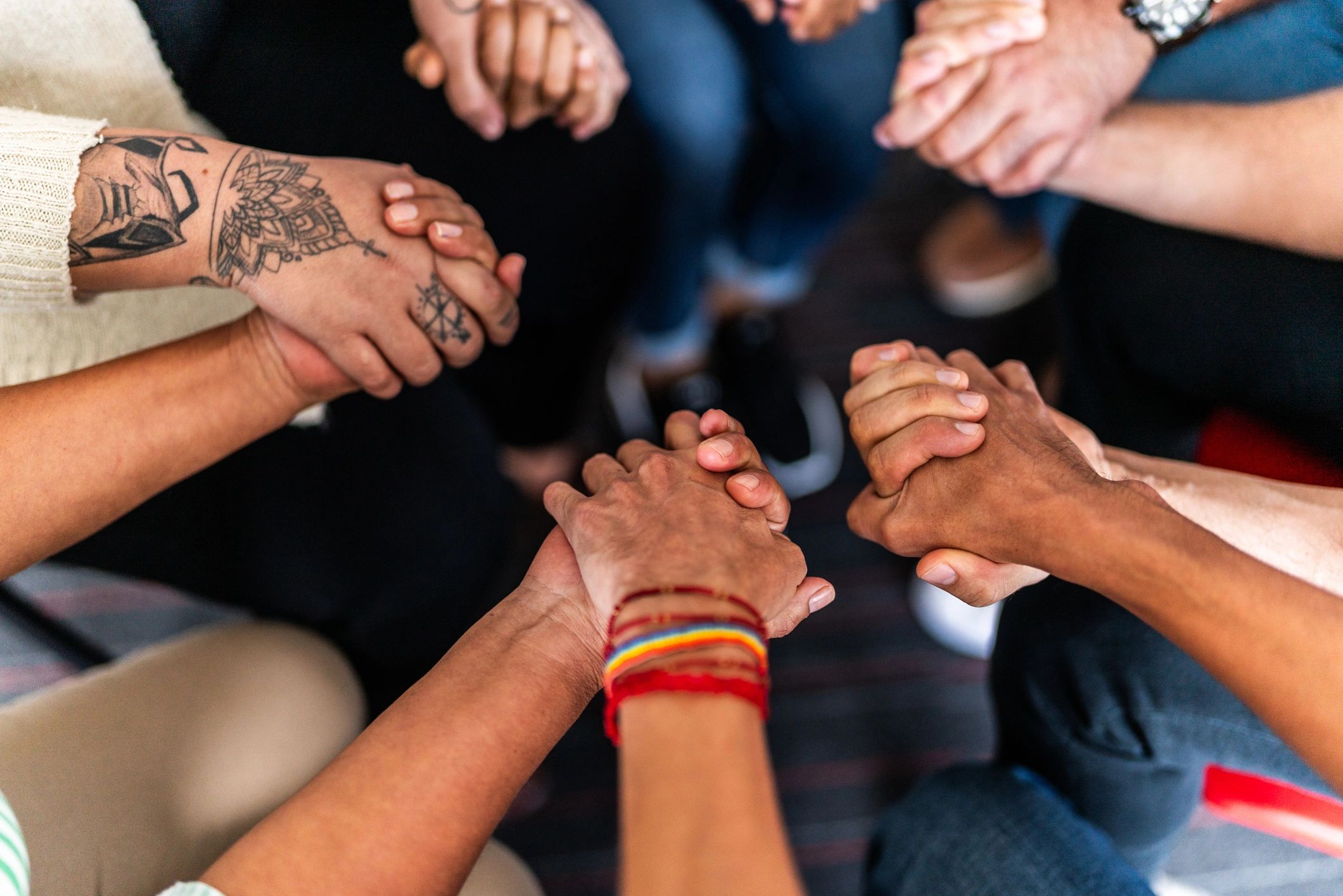 Hands held together in unity